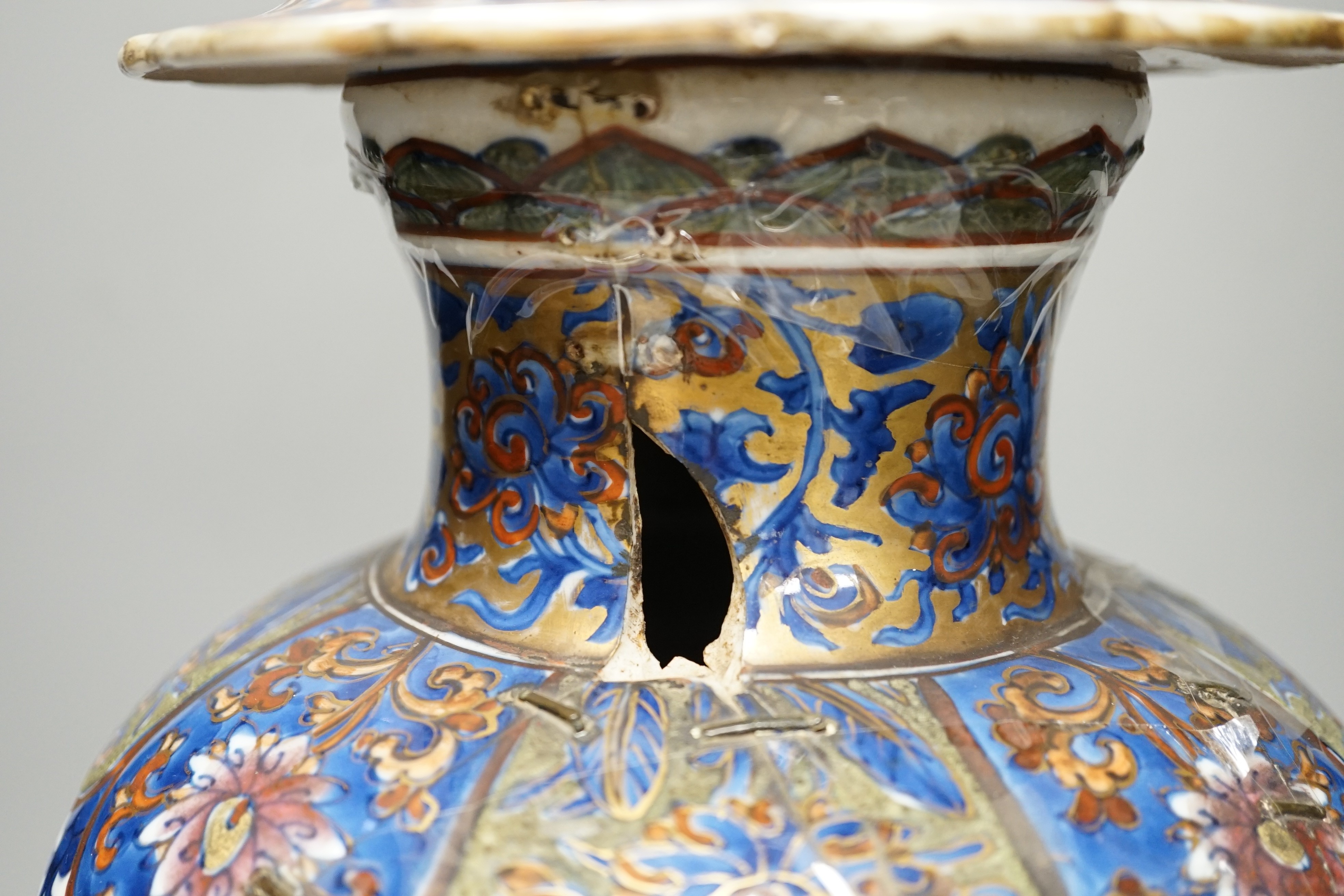 A large Chinese Kangxi vase and cover, clobbered decoration, 44cm tall, damaged